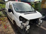 a white van that is sitting in the dirt