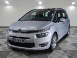the silver citrole is parked on a checkered tile floor