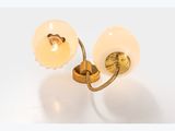pair of brass plated sconces with frosted glass shades
