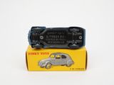 a small toy car sitting on top of a yellow box