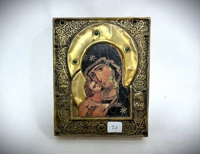 an icon of the virgin mary and child jesus in a gold frame