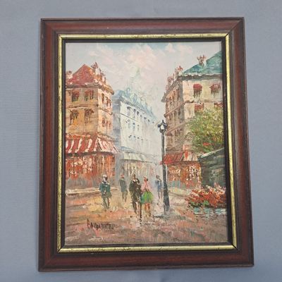 une photo d'un tableau accroché au mur