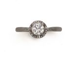 a diamond single - stone ring,
