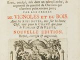 an old book with a black and red title on it