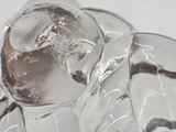 a glass figurine of an elephant on a table