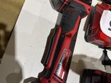 two tools that are sitting on top of a table