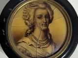 a picture of a woman that is on the wall