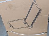 a cardboard box with a drawing of a laptop on it