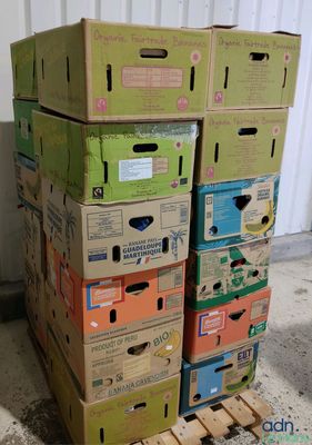 many boxes stacked on top of each other on a pallet