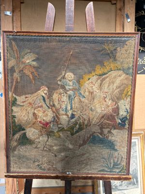 tableau représentant un homme à cheval, posé sur un chevalet devant un tableau