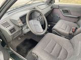 a picture of a car with a steering wheel and a dashboard