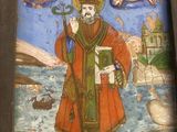 tableau représentant un homme tenant un livre, dans un cadre en bois