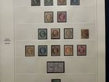 an open book with a bunch of different stamps on it
