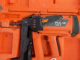 an orange tool case with a stapler and a stapler in it