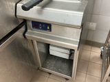 an image of a commercial fryer in a commercial kitchen