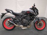 a picture of a motorcycle parked in a garage