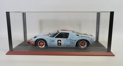 a close up of a model of a car in a glass case