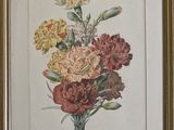 an old picture of a bouquet of carnations in a gold frame