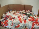 a cardboard box full of food that is in the middle of a room