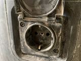 a close up of an electrical outlet in a parking meter