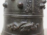 a bell that is sitting on top of a table