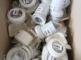 many rolls of toilet paper in a cardboard box