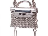 chandelier with chain and silver purse on a white background