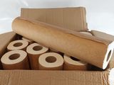 a cardboard box with rolls of toilet paper in it