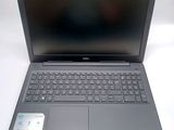 the laptop is open and ready to be used on the table