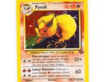 a close up of a pokemon card on a white surface