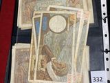 a picture of a book with a lot of money inside of it