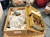 a table with a lot of vases and other items on it