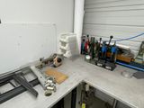 an image of a workbench with tools on it