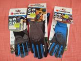 three pairs of gardening gloves are on a pink cloth