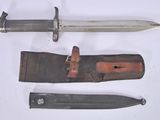 three different types of knives on a white surface