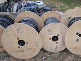 a lot of wires that are sitting on the ground