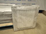 a lot of mattresses that are sitting on a pallet