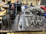 a lot of tools on the table in the room