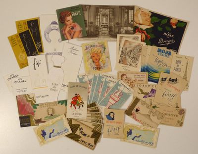 a lot of old postcards on the table