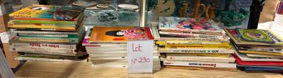 many books on display in a glass case
