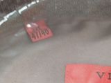 a picture of a plastic bag with a red label on it