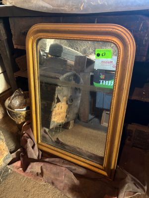a picture of a mirror that is sitting on the floor