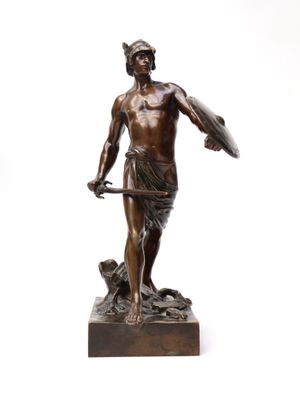 an image of a bronze statue of a man holding a shield and a dog