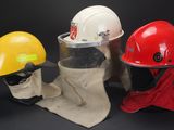 three different types of safety helmets are lined up against a black background