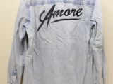 an image of a blue jean jacket with the word gnare written on it