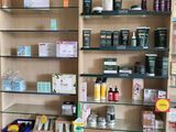a shelf with various products on it in a store