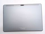 the back of a silver laptop computer sitting on top of a white surface