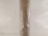 a roll of toilet paper wrapped in plastic on a counter