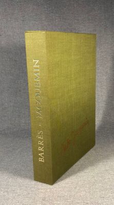 an image of a book with a gold cover sitting on a table