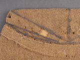 a close up of a piece of fabric with holes in it